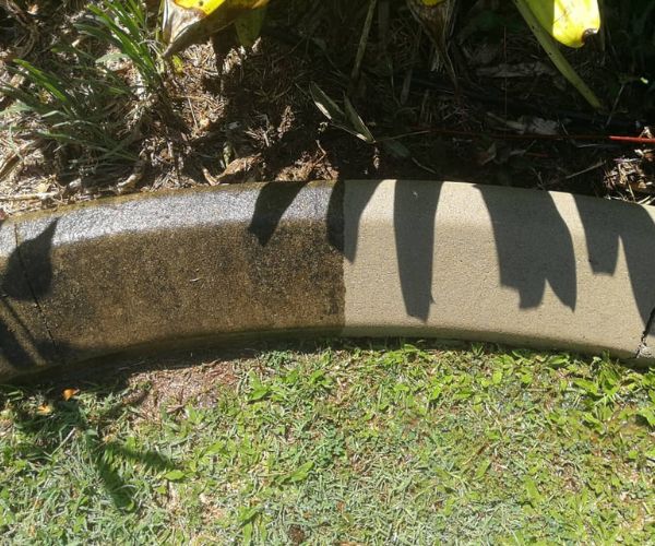 Garden retaining wall pressure washing Toogoom house exterior including garden area
